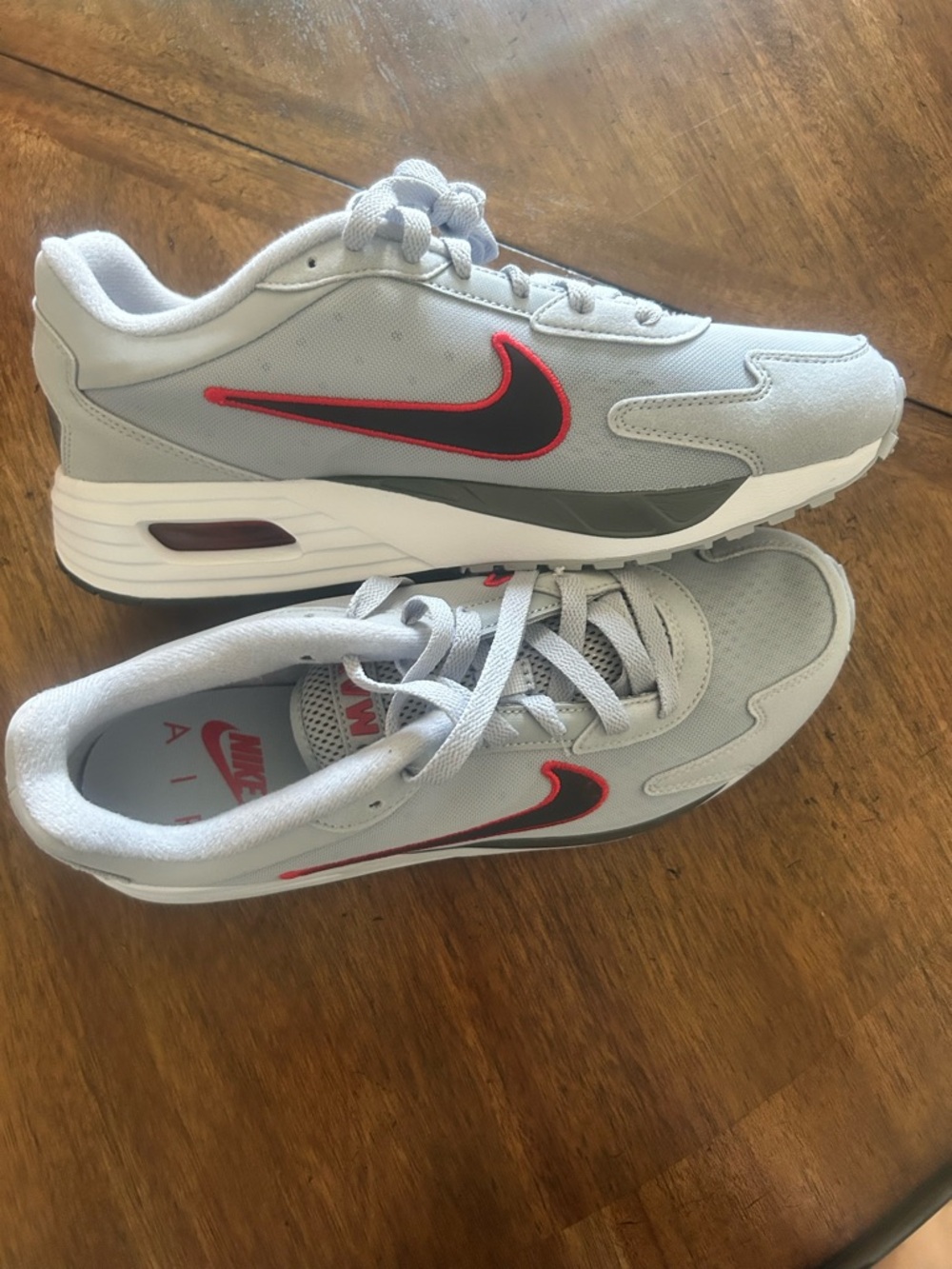 Nike Men's Gray Sneakers with Black and Red Swoosh